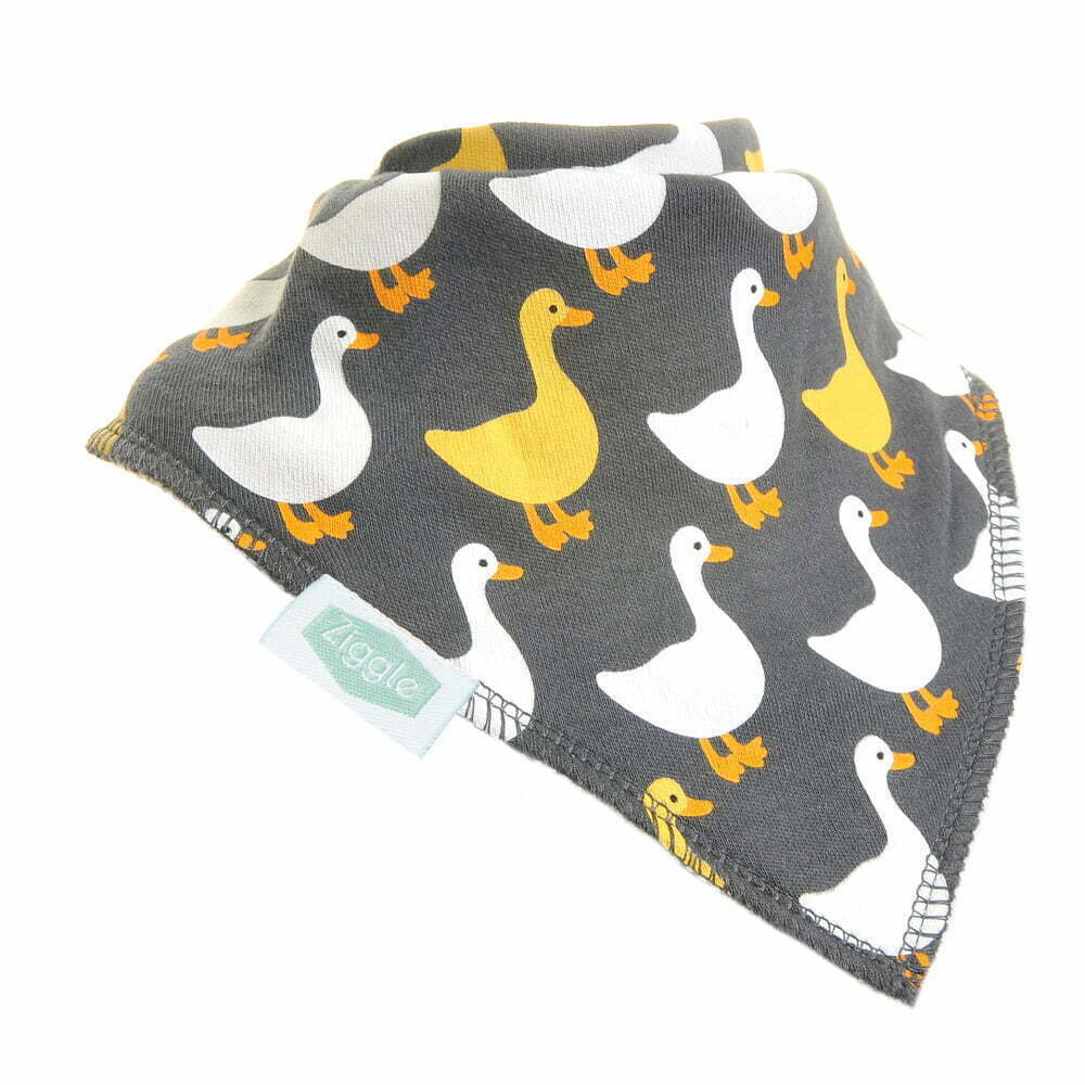 Funky Farm Geese in yellow and white decorate this gorgeous grey dribble bib. Perfect with every outfit